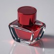 red lid perfume