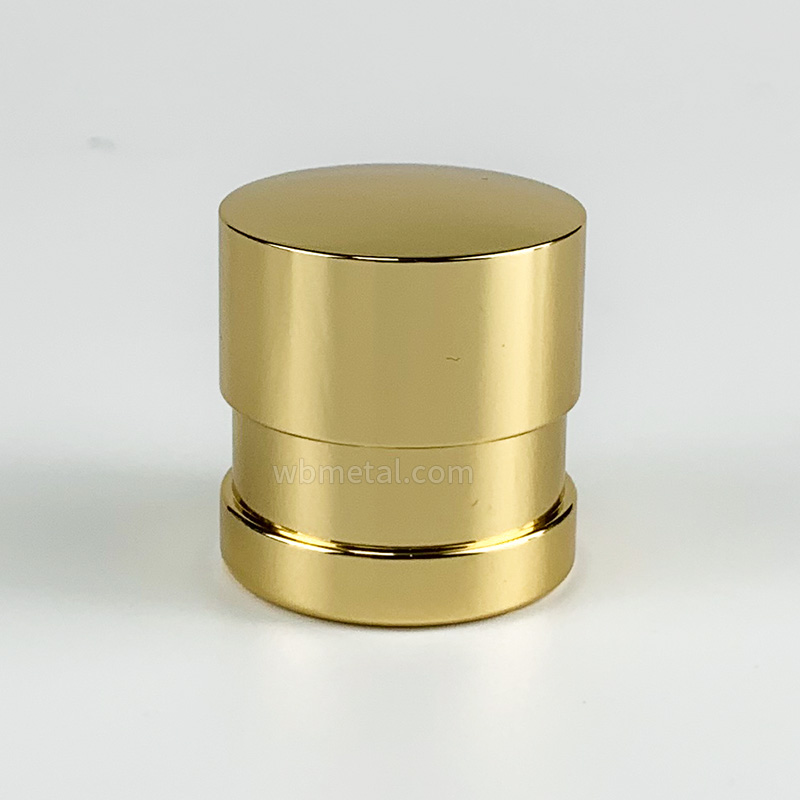 A Cylindrical Zinc Alloy Perfume Cap with Golden Electroplating on the Surface