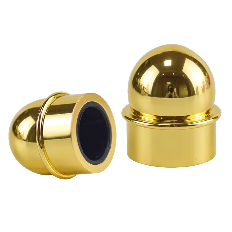 Wbmetal dome-shaped zinc alloy perfume caps shown upright and inverted, with the plastic insert visible inside the opening