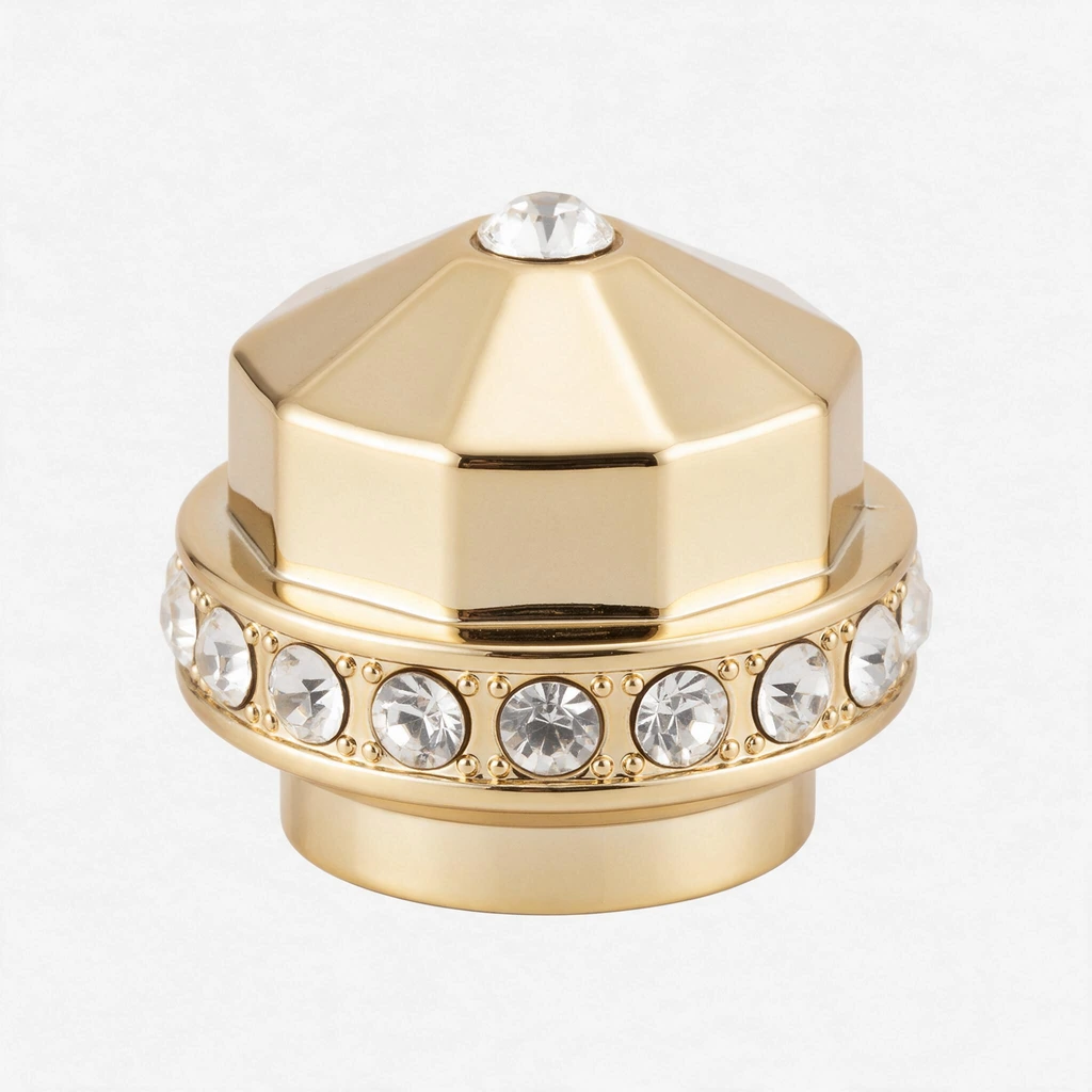 Gold perfume cap design with clear decorative crystal settings
