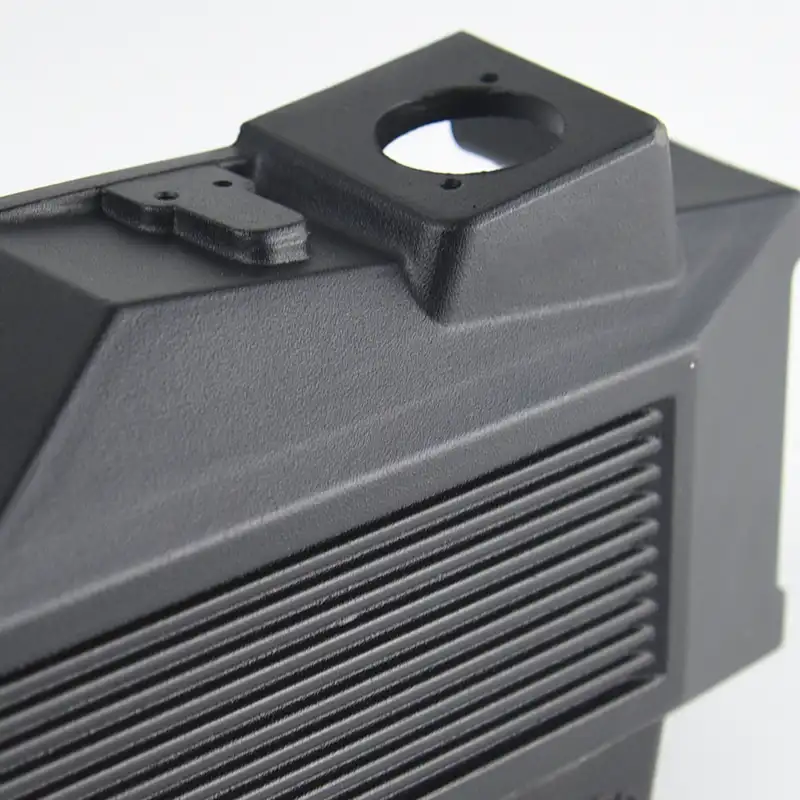 Dark textured powder coating on a metal enclosure